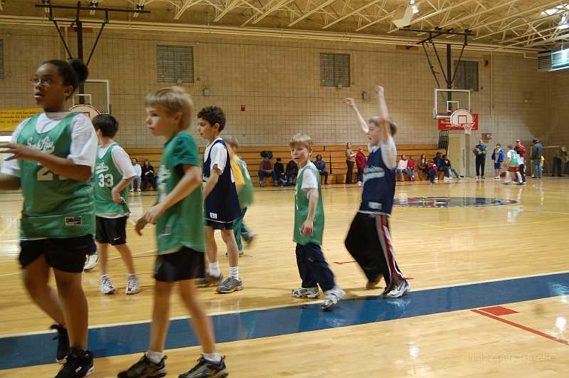 Chace Basketball 2-10 0087.JPG - Chace just scored the second of his two buckets in the last minutes of play.  Their team rallied to within two points of victory in the last minutes of play, but the other team held them off.